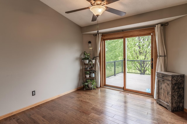 2053 45th St SE, Saint Cloud, MN 56304 - unfurnished room with light wood-style floors, ceiling fan, baseboards, and lofted ceiling