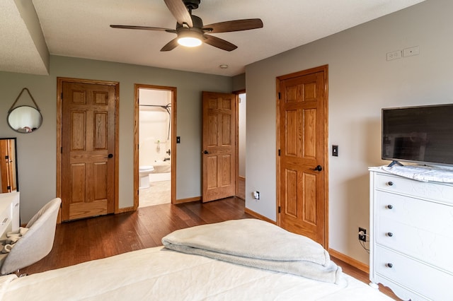 2053 45th St SE, Saint Cloud, MN 56304 - bedroom with wood finished floors, baseboards, ensuite bath, and ceiling fan