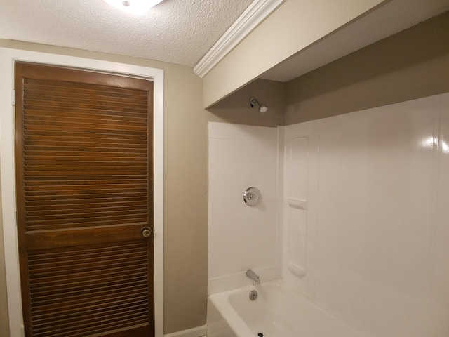 732 Vernon Ave NW, Elk River, MN 55330 - full bathroom with a textured ceiling and washtub / shower combination