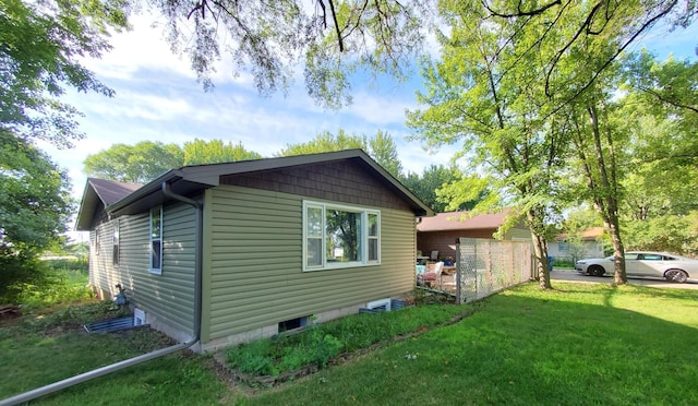 732 Vernon Ave NW, Elk River, MN 55330 - view of side of home featuring a lawn