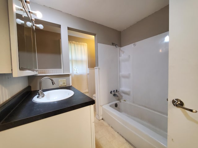 732 Vernon Ave NW, Elk River, MN 55330 - full bathroom with vanity, shower / bath combination, toilet, and tile patterned floors