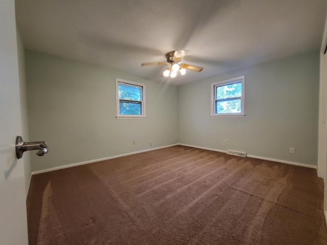 732 Vernon Ave NW, Elk River, MN 55330 - carpeted empty room with baseboards and a ceiling fan