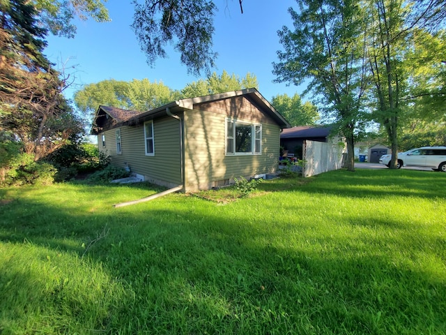 732 Vernon Ave NW, Elk River, MN 55330 - view of side of home with a lawn