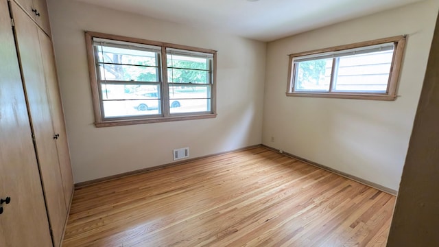4825 Drew Ave S, Minneapolis, MN 55410 - unfurnished bedroom featuring light wood-type flooring, a closet, and baseboards