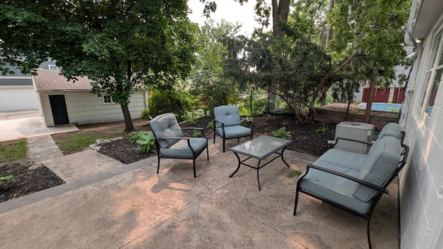 4825 Drew Ave S, Minneapolis, MN 55410 - view of patio / terrace with an outbuilding