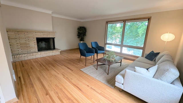 4825 Drew Ave S, Minneapolis, MN 55410 - living area featuring wood finished floors and a fireplace