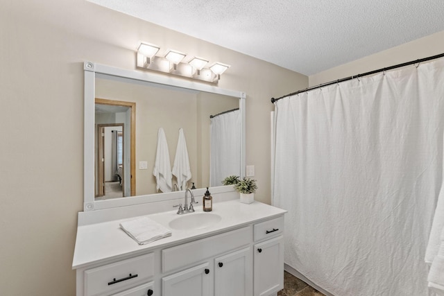 1297 124th Ave NE, Blaine, MN 55434 - full bathroom featuring a textured ceiling and vanity