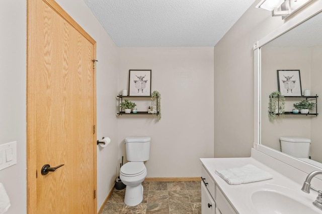 1297 124th Ave NE, Blaine, MN 55434 - bathroom with vanity and a textured ceiling