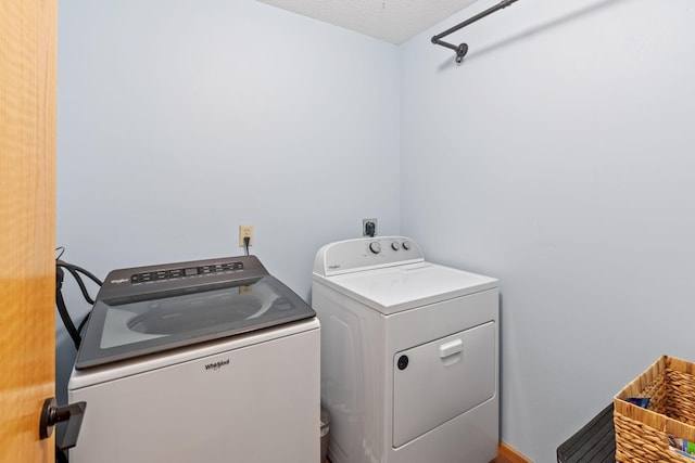 1297 124th Ave NE, Blaine, MN 55434 - laundry room featuring separate washer and dryer