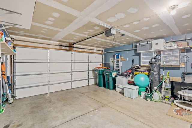 1297 124th Ave NE, Blaine, MN 55434 - garage featuring a garage door opener