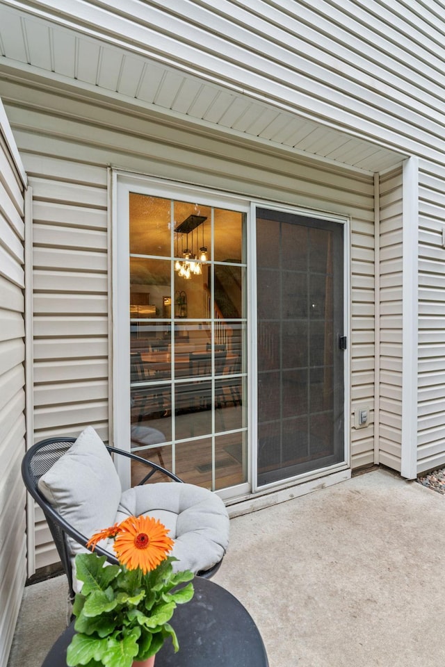 1297 124th Ave NE, Blaine, MN 55434 - entrance to property featuring a patio area