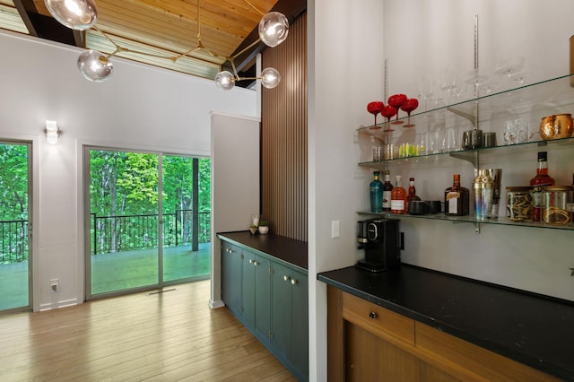18101 Woolman Dr, Minnetonka, MN 55345 - indoor dry bar with wooden ceiling, light wood-style floors, and a chandelier