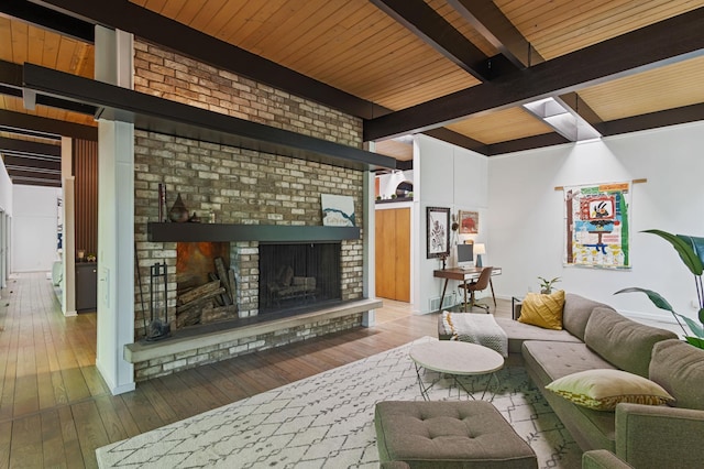 18101 Woolman Dr, Minnetonka, MN 55345 - living room featuring beam ceiling, hardwood / wood-style floors, and a brick fireplace