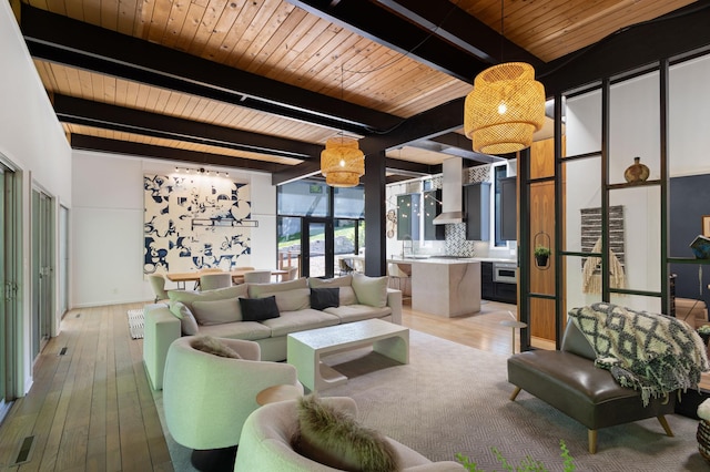 18101 Woolman Dr, Minnetonka, MN 55345 - living area with wooden ceiling with exposed beams and light wood-style flooring