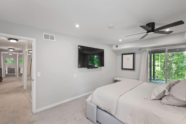 18101 Woolman Dr, Minnetonka, MN 55345 - bedroom with light colored carpet, baseboards, recessed lighting, and ceiling fan