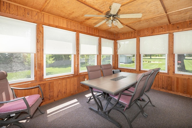 176 Westchester Dr NW, Rochester, MN 55901 - sunroom featuring healthy amount of natural light, wooden walls, carpet flooring, and wood ceiling