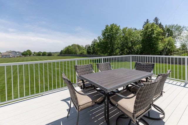 176 Westchester Dr NW, Rochester, MN 55901 - wooden terrace with outdoor dining space and a lawn