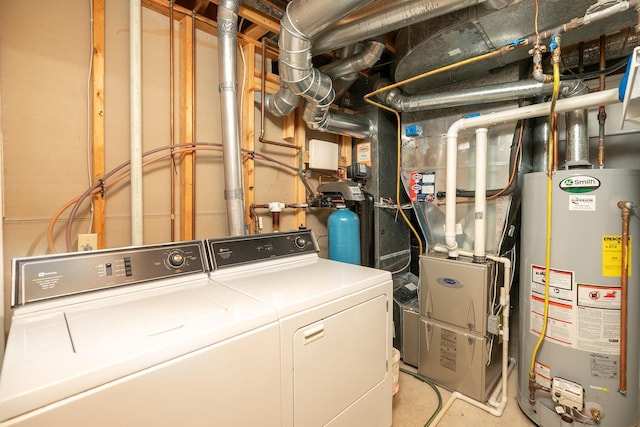 176 Westchester Dr NW, Rochester, MN 55901 - washroom featuring gas water heater and washer and clothes dryer