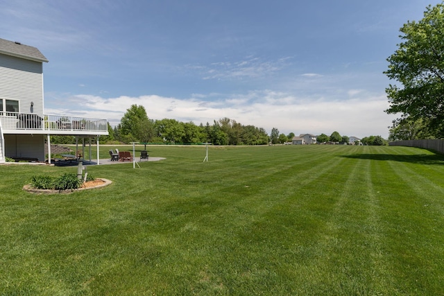 176 Westchester Dr NW, Rochester, MN 55901 - view of grassy yard with an outdoor fire pit