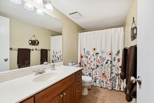 20 2nd St NE Unit P1008, Minneapolis, MN 55413 - full bathroom featuring toilet, vanity, tile patterned flooring, a textured ceiling, and curtained shower