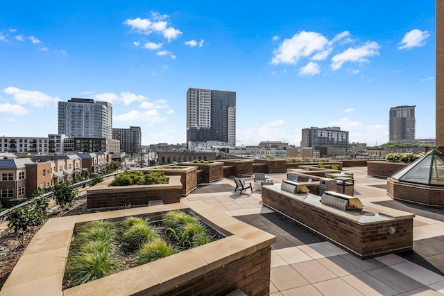 20 2nd St NE Unit P1008, Minneapolis, MN 55413 - view of patio / terrace featuring a city view