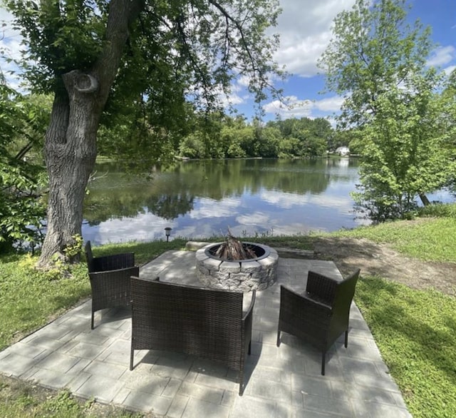 1733 37th Ave NE, Columbia Heights, MN 55421 - view of patio with an outdoor fire pit and a water view