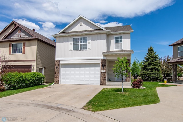 4110 Clubhouse Dr S, Fargo, ND 58104 - traditional-style house with a garage, concrete driveway, a front yard, and brick siding