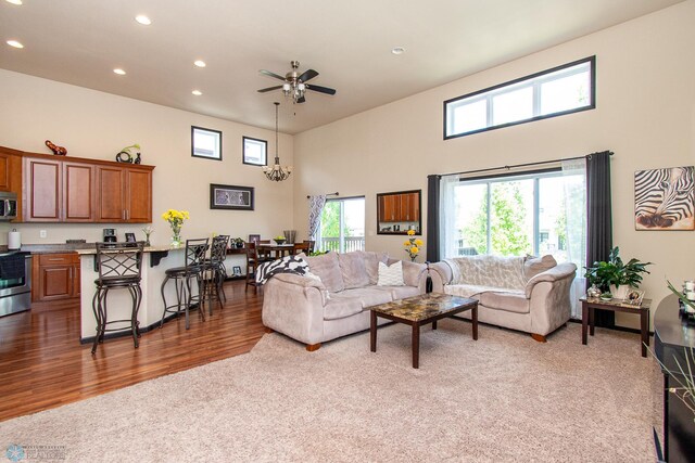 4110 Clubhouse Dr S, Fargo, ND 58104 - living area with recessed lighting, a towering ceiling, ceiling fan, and light wood-type flooring