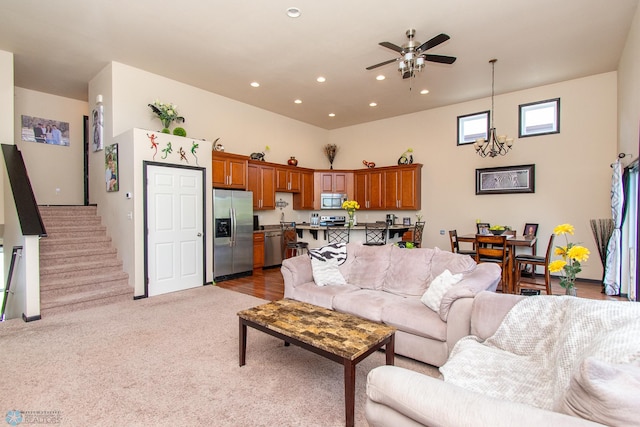 4110 Clubhouse Dr S, Fargo, ND 58104 - living area with a ceiling fan, light carpet, stairs, and recessed lighting