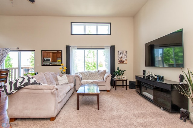 4110 Clubhouse Dr S, Fargo, ND 58104 - living room featuring a high ceiling and ceiling fan