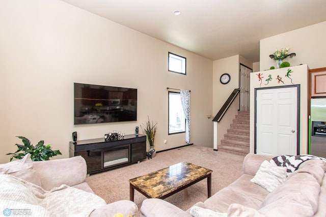 4110 Clubhouse Dr S, Fargo, ND 58104 - living room with light carpet and stairs
