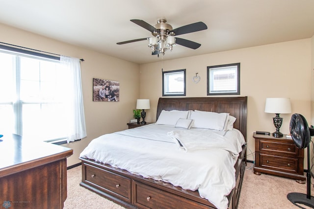 4110 Clubhouse Dr S, Fargo, ND 58104 - bedroom featuring light colored carpet and ceiling fan