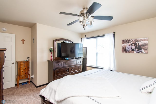 4110 Clubhouse Dr S, Fargo, ND 58104 - bedroom with light colored carpet and a ceiling fan