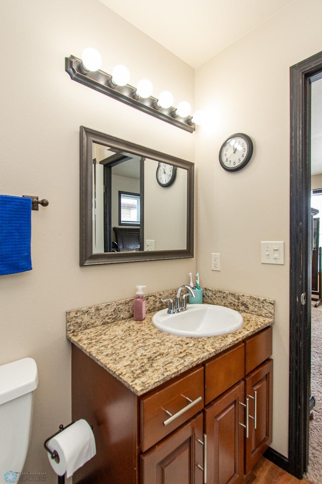 4110 Clubhouse Dr S, Fargo, ND 58104 - bathroom with vanity and toilet