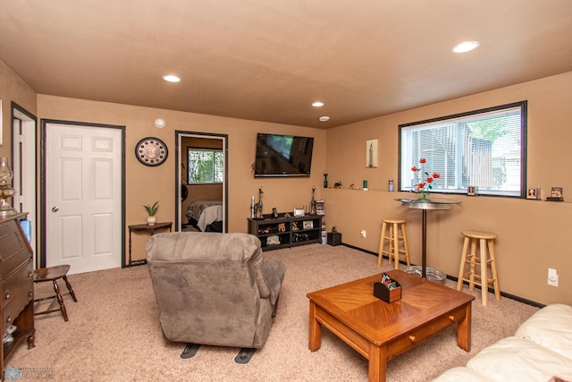 4110 Clubhouse Dr S, Fargo, ND 58104 - living room with light colored carpet, recessed lighting, and baseboards