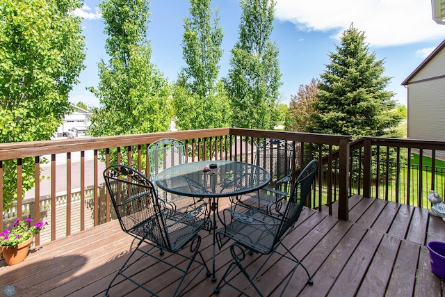 4110 Clubhouse Dr S, Fargo, ND 58104 - wooden deck featuring outdoor dining space