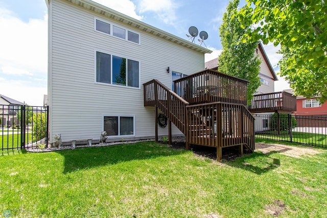 4110 Clubhouse Dr S, Fargo, ND 58104 - rear view of property with stairway and a wooden deck