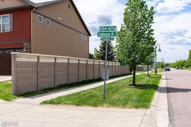 4110 Clubhouse Dr S, Fargo, ND 58104 - view of side of property with a garage