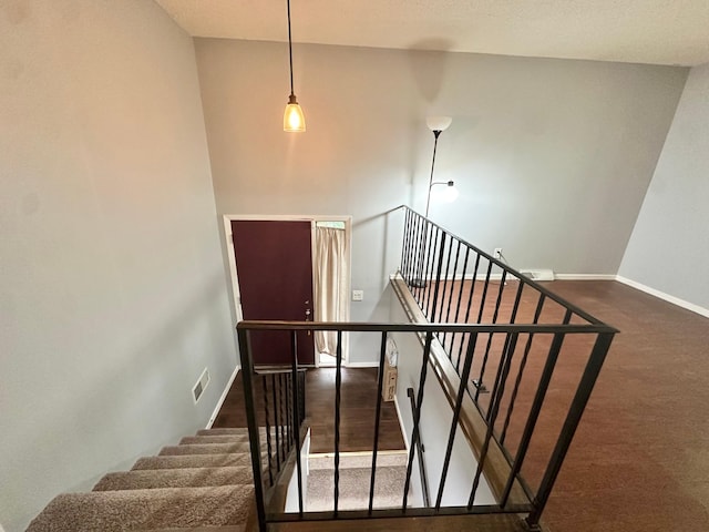 9329 Bass Creek Cir N, New Hope, MN 55428 - stairs featuring baseboards and carpet floors