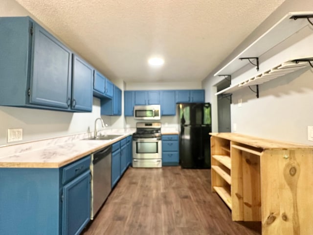 9329 Bass Creek Cir N, New Hope, MN 55428 - kitchen with stainless steel appliances, open shelves, a sink, blue cabinets, and dark wood-type flooring