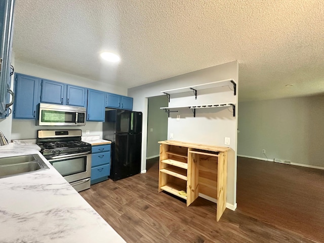 9329 Bass Creek Cir N, New Hope, MN 55428 - kitchen featuring appliances with stainless steel finishes, blue cabinetry, light countertops, a textured ceiling, and a sink
