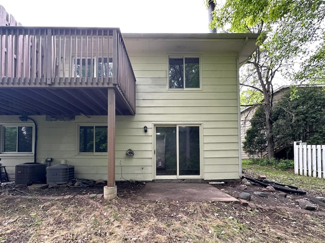 9329 Bass Creek Cir N, New Hope, MN 55428 - rear view of property featuring cooling unit