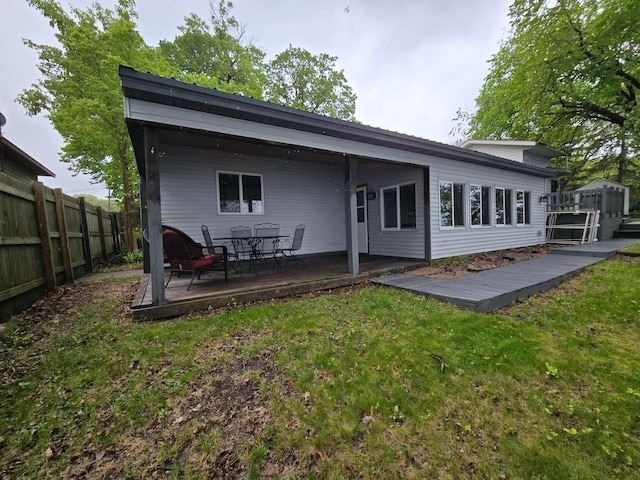 337 Lake Ave N, Spicer, MN 56288 - rear view of house with a wooden deck