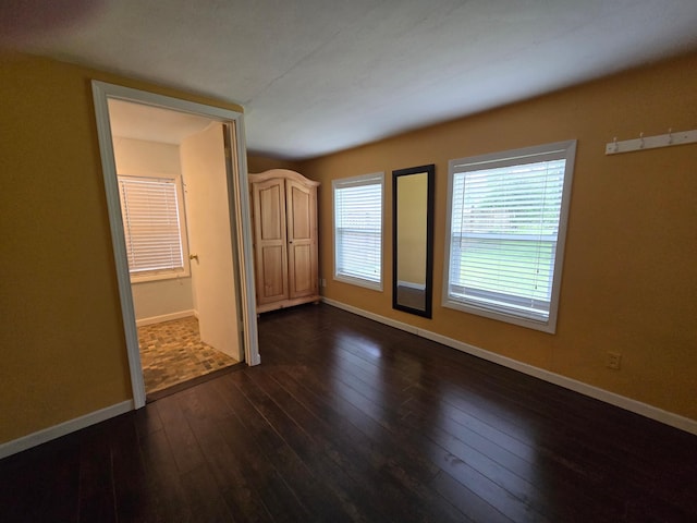 337 Lake Ave N, Spicer, MN 56288 - unfurnished room with baseboards and dark wood-style floors