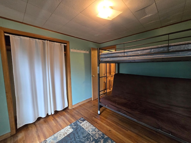 337 Lake Ave N, Spicer, MN 56288 - unfurnished bedroom featuring wood finished floors