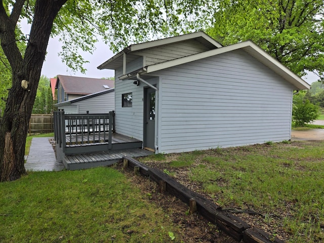 337 Lake Ave N, Spicer, MN 56288 - rear view of house featuring a deck