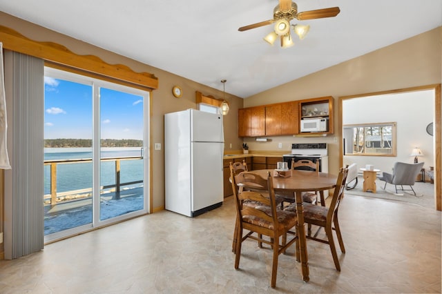2648 Lake Shore Dr, Scandia Valley Twp, MN 56466 - dining space featuring ceiling fan, a water view, and lofted ceiling