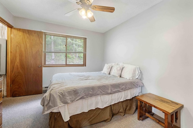 2648 Lake Shore Dr, Scandia Valley Twp, MN 56466 - carpeted bedroom featuring ceiling fan and a baseboard radiator