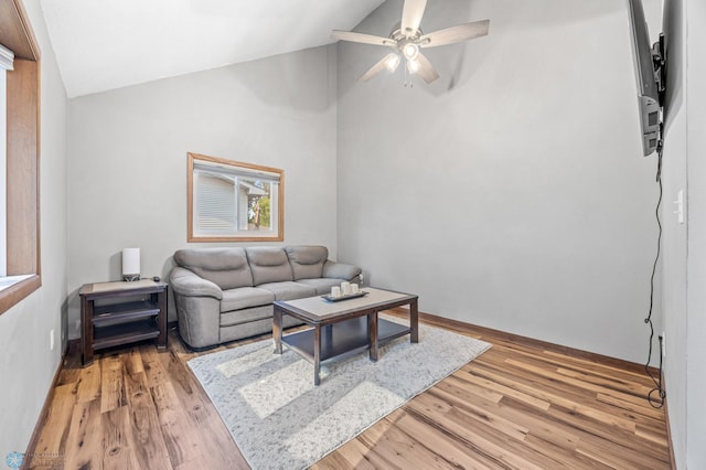 805 7th St NE, Dilworth, MN 56529 - living room featuring lofted ceiling, ceiling fan, light wood-type flooring, plenty of natural light, and baseboards