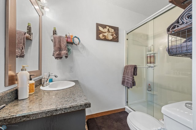 805 7th St NE, Dilworth, MN 56529 - full bath with toilet, a shower stall, and vanity